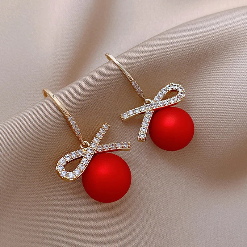 Gold Zircon Bowknot Stud Earrings with Red Pearl Flower