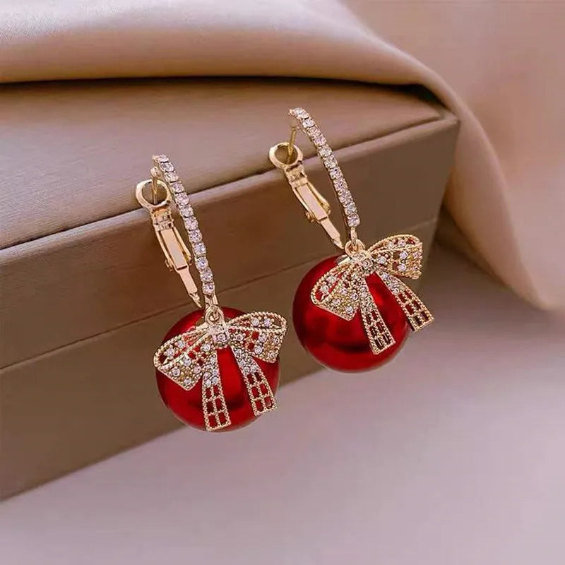 Gold Zircon Bowknot Stud Earrings with Red Pearl Flower