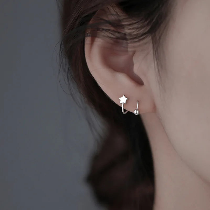 Boucles d'oreilles rotatives en acier inoxydable pour femmes