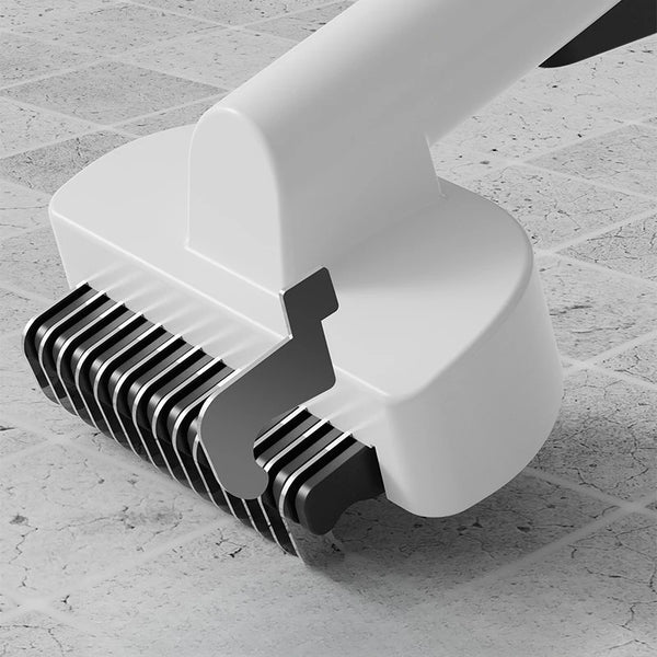 Haustierkamm mit Detailansicht des Selbstreinigungsmechanismus.