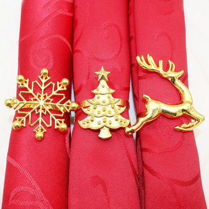 Ensemble de ronds de serviette de Noël dorés