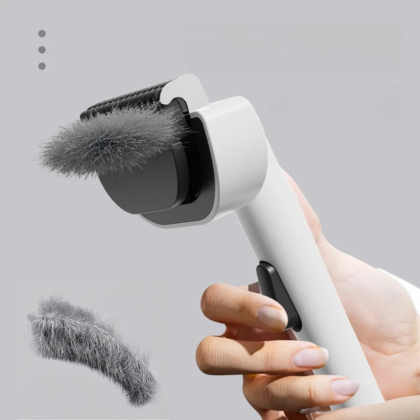 Langhaar-Hundebürste mit Ein-Klick-Griff aus ABS und Edelstahl.