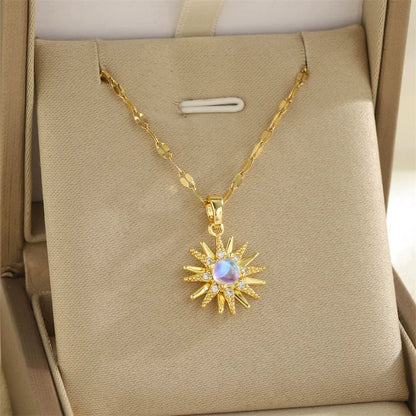 Collier en or avec pendentif fleur, zircone incrustée, chaîne en acier titane et pendentif soleil en opale (1 pièce).