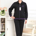 Black top with purple trim + black pants with purple trim