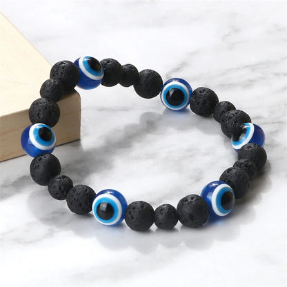 Unisex Black Matte Lava Bead Bracelet Blue Evil Eye Charm – Lucky Protection Bangle