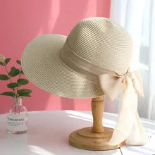 Chapeau de soleil bohème chic en paille avec visière à nœud pour femmes 
