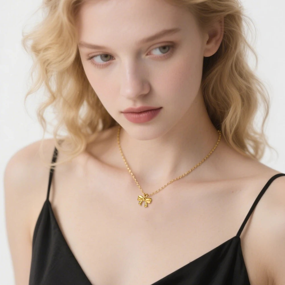 Collier pendentif nœud papillon en acier inoxydable pour femme