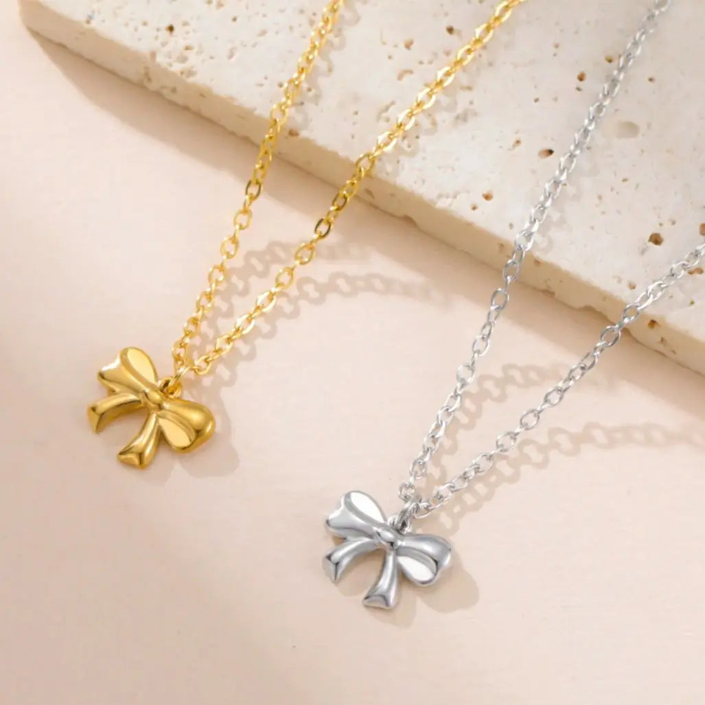 Collier pendentif nœud papillon en acier inoxydable pour femme