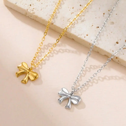 Collier pendentif nœud papillon en acier inoxydable pour femme