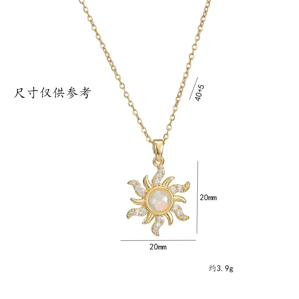 Collier en or avec pendentif fleur, zircone incrustée, chaîne en acier titane et pendentif soleil en opale (1 pièce).