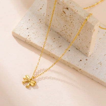 Collier pendentif nœud papillon en acier inoxydable pour femme