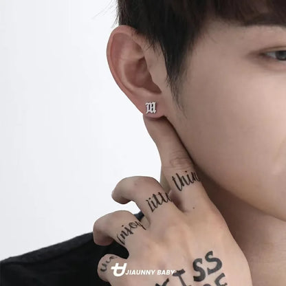 Boucles d'oreilles minimalistes en acier titane pour hommes - Goujons ronds noirs à goutte d'huile