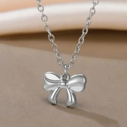 Collier pendentif nœud papillon en acier inoxydable pour femme