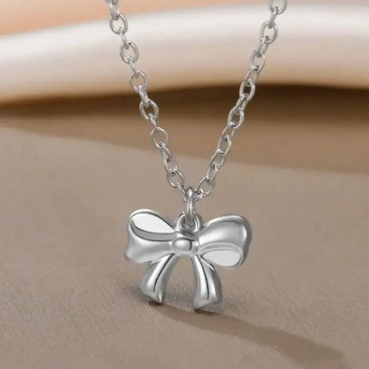 Colliers à nœud avec pendentif long pampille couleur argent