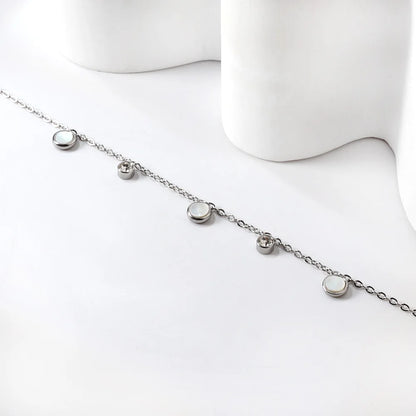 Damenarmband aus vergoldetem Edelstahl mit weißer Muschel und Zirkonia