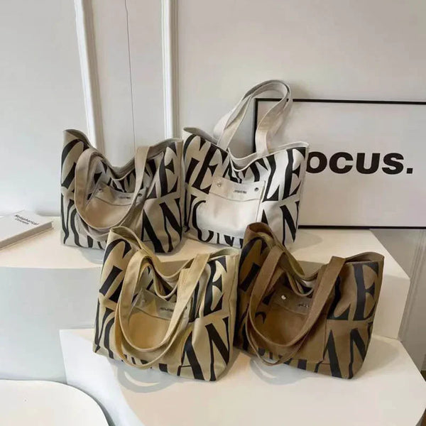 Large capacity canvas shoulder tote bag made of polyester.