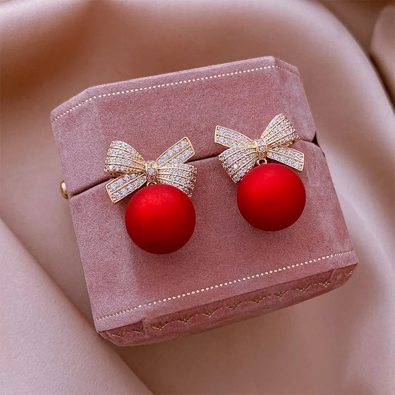 Gold Zircon Bowknot Stud Earrings with Red Pearl Flower