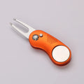 Orange divot tool